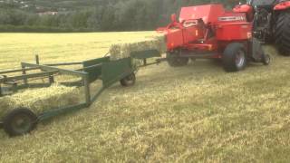 Small baling with Massey Ferguson 1840 baler [upl. by Dyna926]