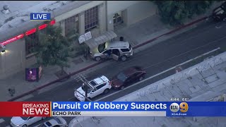 Armed Robbery Suspects Lead Police On HighSpeed Chase Across LA [upl. by Janey]