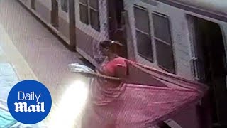 Horrifying moment women dragged after saree got stuck in train [upl. by Cristine]