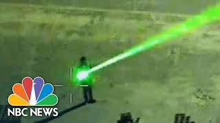 Authorities Warn Of Dangers Of Pointing Lasers At Aircraft  NBC Nightly News [upl. by Ajssatsan853]