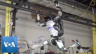 Boston Dynamics’ Humanoid Robot Shows Off Gymnastic Routine [upl. by Fortunio]