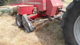 Massey Ferguson 1840 baling hay [upl. by Yengac]