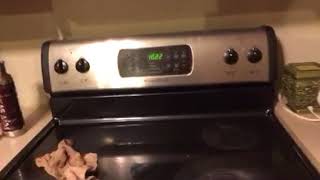 How To Set The Clock On A Frigidaire Stove [upl. by Ceevah958]