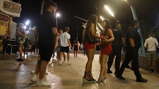 Magaluf residents fury as drunk British holidaymakers wear no masks and jump on cars [upl. by Areehs803]