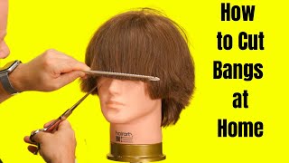 How to Cut Bangs at Home  TheSalonGuy [upl. by Hgielrebmik]