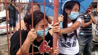 Typhoon Haiyan Living with the dead in Tacloban [upl. by Yliak]